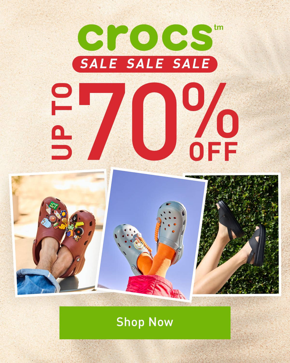 Crocs sale promotional banner with three photo panels showing different Croc-style slip-on shoes worn by people in outdoor settings, alongside large text reading 'Crocs Sale Sale Sale UP TO 70% OFF' and a green 'Shop Now' button.