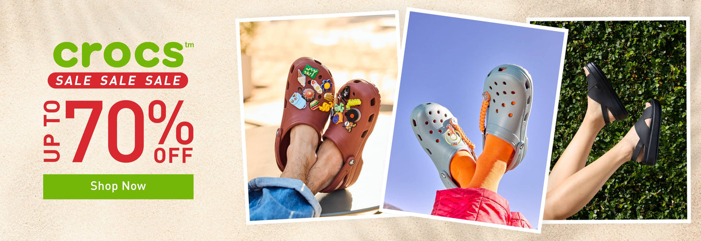 Crocs sale promotional banner with three photo panels showing different Croc-style slip-on shoes worn by people in outdoor settings, alongside large text reading 'Crocs Sale Sale Sale UP TO 70% OFF' and a green 'Shop Now' button.